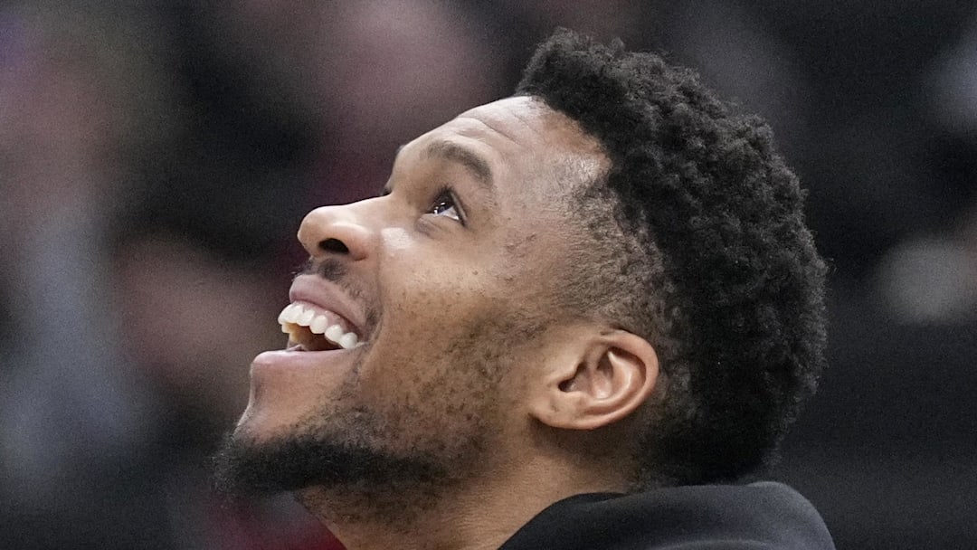 Milwaukee Bucks forward Giannis Antetokounmpo (34) claps as his brother, Milwaukee Bucks forward Alex Antetokounmpo (29), not pictured, scores on a made basket against the Memphis Grizzlies in the second half at Fiserv Forum. on April 5, 2026.