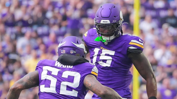 Minnesota Vikings LBs Dallas Turner (15) and Jihad Ward (52) 