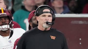 Nov 16, 2025; Madrid, Spain; Washington Commanders head coach Dan Quinn looks on in the fourth quarter during the 2025 NFL Madrid Game against the Miami Dolphins at Santiago Bernabeu Stadium. Mandatory Credit: Kirby Lee-Imagn Images