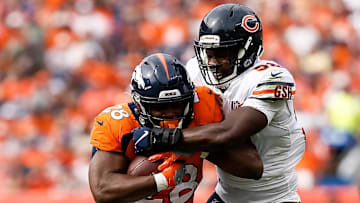 Sep 15, 2019; Denver, CO, USA; Chicago Bears linebacker Roquan Smith (58) tackles Denver Broncos running back Royce Freeman (28) in the second quarter at Empower Field at Mile High. Mandatory Credit: Isaiah J. Downing-Imagn Images