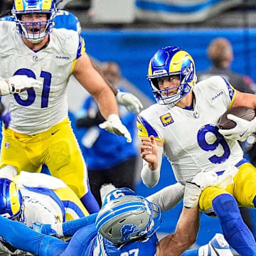 Los Angeles Rams quarterback Matthew Stafford (9) is sacked by Detroit Lions defensive end Aidan Hutchinson (97) during the second half at Ford Field in Detroit on Sunday, September 8, 2024.