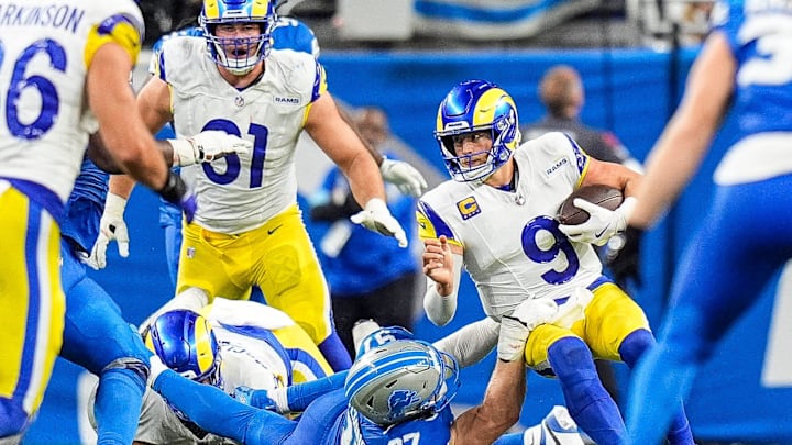 Los Angeles Rams quarterback Matthew Stafford (9) is sacked by Detroit Lions defensive end Aidan Hutchinson (97) during the second half at Ford Field in Detroit on Sunday, September 8, 2024.