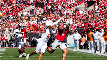 Ohio State Buckeyes wide receiver Brandon Inniss (1) attempts to catch a pass against Texas Longhorns defensive back Jordon Johnson-Rubell (23) in the first half at Ohio Stadium on Saturday, Aug. 30, 2025 in Columbus, Ohio.