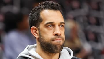 Atlanta Hawks general manager Landry Fields looks on against the Boston Celtics.