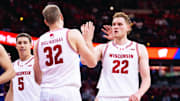 Austin Rapp (22) celebrated Aleksas Bieliauskas (32) basket and getting fouled in the first half. Wisconsin beat Northwestern, 85-73, to open Big Ten play on December 3, 2025.