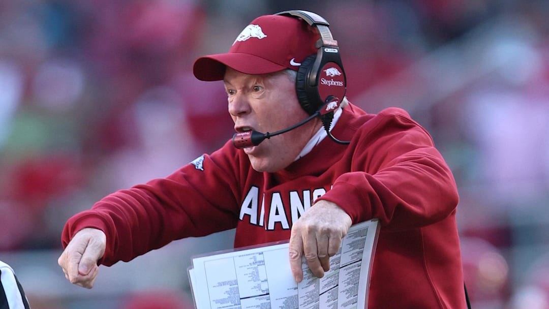 Arkansas Razorbacks interim coach Bobby Petrino argues with an official during the third quarter against the Mississippi State Bulldogs at Donald W. Reynolds Razorback Stadium during the Hogs' homecoming game Saturday.