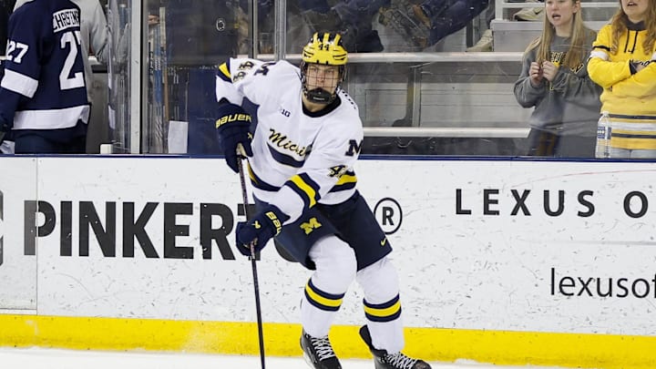 March 8, 2025; Ann Arbor, Michigan, USA; Michigan Wolverines forward Will Horcoff (44) handles the puck during the first period against the Penn State Nittany Lions at Yost Ice Arena. Mandatory Credit: Brian Bradshaw Sevald-Imagn Images
