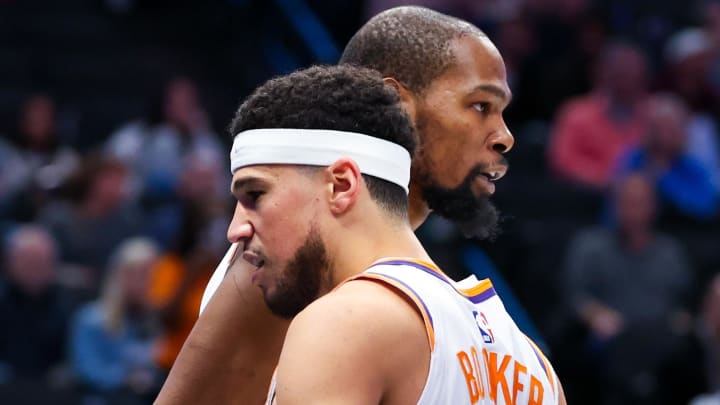 Jan 24, 2024; Dallas, Texas, USA;  Phoenix Suns forward Kevin Durant (35) celebrates with Phoenix Suns guard Devin Booker (1) during the third quarter against the Dallas Mavericks at American Airlines Center. Mandatory Credit: Kevin Jairaj-USA TODAY Sports