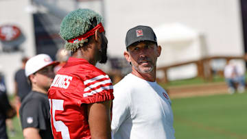 San Francisco 49ers wide receiver Jauan Jennings (L) and head coach Kyle Shanahan (R)
