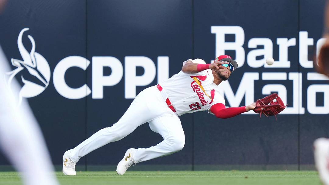Mar 7, 2026; Jupiter, Florida, USA; St. Louis Cardinals right fielder Joshua Baez (22) makes a diving catch in the first inning against the New York Mets at Roger Dean Chevrolet Stadium. Mandatory Credit: Jim Rassol-Imagn Images Mar 7, 2026; Jupiter, Florida, USA; St. Louis Cardinals right fielder Joshua Baez (22) makes a diving catch in the first inning against the New York Mets at Roger Dean Chevrolet Stadium. Mandatory Credit: Jim Rassol-Imagn Images