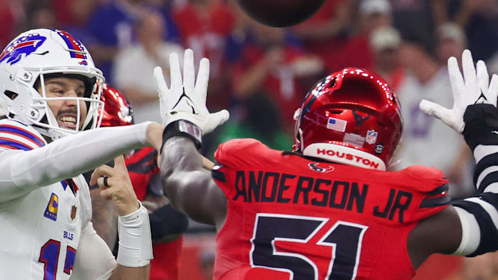 Nov 20, 2025; Houston, Texas, USA; Buffalo Bills quarterback Josh Allen (17) passes against Houston Texans defensive end Will Anderson Jr. (51) in the first quarter at NRG Stadium. 