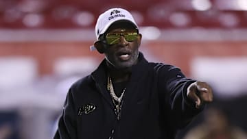 Oct 25, 2025; Salt Lake City, Utah, USA; Colorado Buffaloes head coach Deion Sanders coaches before the game against the Utah Utes at Rice-Eccles Stadium.