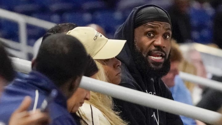 LeBron James and his wife Savannah Brinson watch Bronny James participate in the 2024 NBA draft combine at Wintrust Arena.