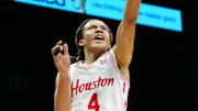 Nov 25, 2025; Las Vegas, NV, USA; Houston Cougars guard Kingston Flemings (4) goes for a layup in a 2025 Players Era Festival group play game against the Tennessee Volunteers during the first half at MGM Grand Garden Arena. Mandatory Credit: Stephen R. Sylvanie-Imagn Images