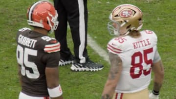 Myles Garrett and George Kittle were seen chatting as Garrett closes in on the single-season sack record. 