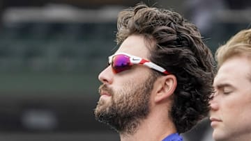 Chicago Cubs shortstop Dansby Swanson (7) stands for the national anthem