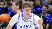 Mar 1, 2025; Durham, North Carolina, USA;  Duke Blue Devils forward Cooper Flagg (2) reacts after scoring during the first half against the Florida State Seminoles at Cameron Indoor Stadium. Mandatory Credit: Zachary Taft-Imagn Images