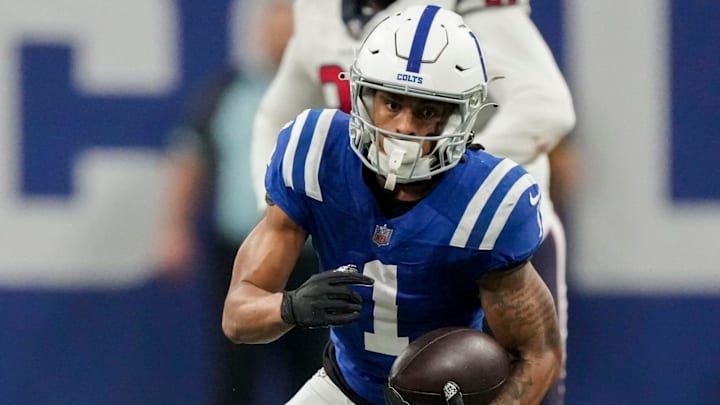 Indianapolis Colts wide receiver Josh Downs (1) rushes the ball Saturday, Jan. 6, 2024, during a game against the Houston Texans at Lucas Oil Stadium in Indianapolis.