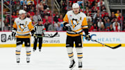 Nov 7, 2024; Raleigh, North Carolina, USA;  Pittsburgh Penguins center Sidney Crosby (87) and center Evgeni Malkin (71) skate up the ice against the Carolina Hurricanes during the second period at Lenovo Center. Mandatory Credit: James Guillory-Imagn Images