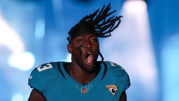 Dec 17, 2023; Jacksonville, Florida, USA;  Jacksonville Jaguars linebacker Devin Lloyd (33) takes the field for a game against the Baltimore Ravens at EverBank Stadium. Mandatory Credit: Nathan Ray Seebeck-Imagn Images