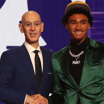 Jalen Hood-Schifino with NBA commissioner Adam Silver after being selected seventeenth by the Los Angeles Lakers in the first round of the 2023 NBA Draft.