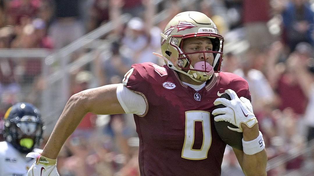 Sep 6, 2025; Tallahassee, Florida, USA; Florida State Seminoles wide receiver Duce Robinson (0) catches a touchdown during the first half against the East Texas A&M at Doak S. Campbell Stadium. Mandatory Credit: Melina Myers-Imagn Images Sep 6, 2025; Tallahassee, Florida, USA; Florida State Seminoles wide receiver Duce Robinson (0) catches a touchdown during the first half against the East Texas A&M at Doak S. Campbell Stadium. Mandatory Credit: Melina Myers-Imagn Images