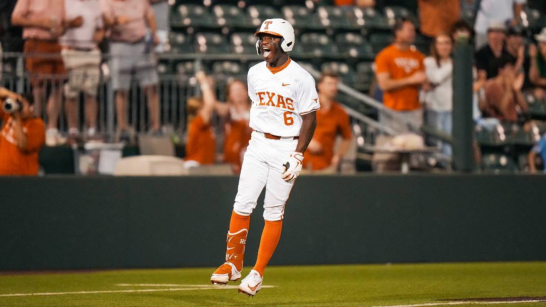 Texas Longhorns' outfielder Anthony Pack Jr. celebrates a grand slam against the USC Upstate Spartans.