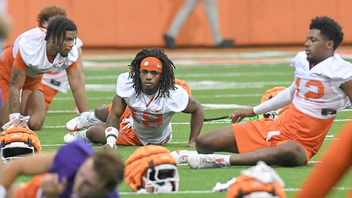 Clemson wide receiver T.J. Moore (1), left, Misun Kelley (18), and Bryant Wesco Jr. (12) during the Clemson first football August practice in Clemson, S.C. Thursday August 1, 2024.