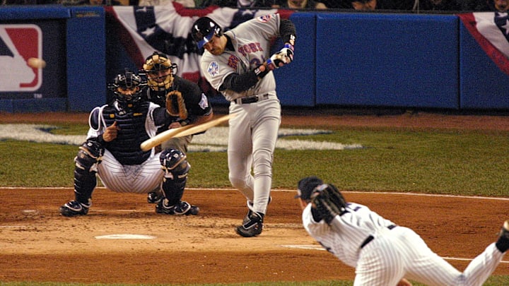 Oct 22, 2000; New York, NY, USA;  Mike Piazza's bat breaks during a first inning at bat against Yankees pitcher Roger Clemens in the second game of the World Series at Yankee Stadium in New York.Mandatory Credit: Eileen Blass/USA TODAY-USA TODAY NETWORK