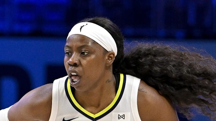 Arike Ogunbowale in action during the game between the Dallas Wings and the New York Liberty.