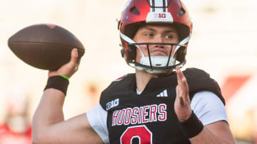 Indiana's Kurtis Rourke (9) passes during Indiana football spring practice at Memorial Stadium on Thursday, March 21, 2024.