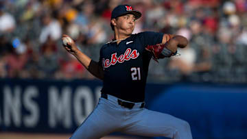 Ole Miss Rebels' Mason Morris (21) pitches
