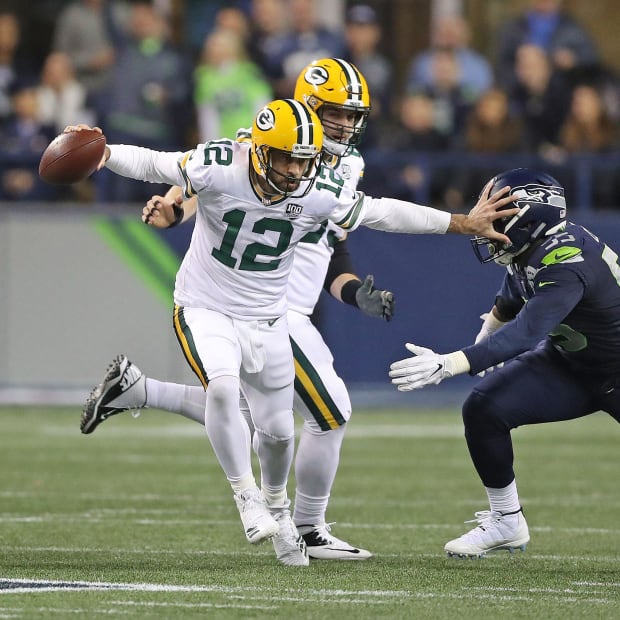 Aaron Rodgers quarterbacks the Green Bay Packers in 2018.