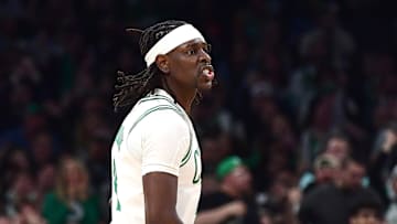 Apr 20, 2025; Boston, Massachusetts, USA; Boston Celtics guard Jrue Holiday (4) reacts after a three point basket during the second half against the Orlando Magic at TD Garden. Mandatory Credit: Bob DeChiara-Imagn Images