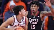 Nov 11, 2025; Champaign, Illinois, USA; Texas Tech Red Raiders forward JT Toppin (15) defends against Illinois Fighting Illini guard Andrej Stojakovic (2) during the second half at State Farm Center. Mandatory Credit: Ron Johnson-Imagn Images