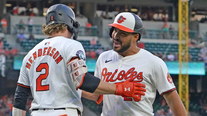 Aug 13, 2024; Baltimore, Maryland, USA; Baltimore Orioles outfielder Anthony Santander (25) celebrates his third inning solo home run against the Washington Nationals with shortstop Gunnar Henderson (2) at Oriole Park at Camden Yards. Mandatory Credit: Mitch Stringer-USA TODAY Sports