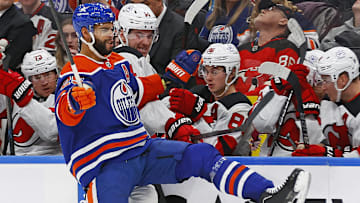 Dec 10, 2023; Edmonton, Alberta, CAN; Edmonton Oilers defensemen Darnell Nurse (25) tries to check