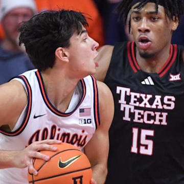 Nov 11, 2025; Champaign, Illinois, USA; Texas Tech Red Raiders forward JT Toppin (15) defends against Illinois Fighting Illini guard Andrej Stojakovic (2) during the second half at State Farm Center. Mandatory Credit: Ron Johnson-Imagn Images