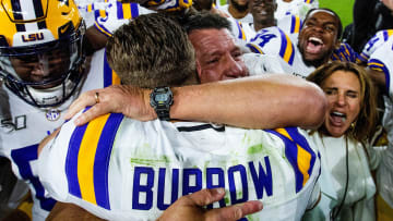 LSU head coach Ed Orgeron hugs quarterback Joe Burrow (9) after defeating Alabama at Bryant-Denny Stadium in Tuscaloosa, Ala., on Saturday November 9, 2019.

Bama935