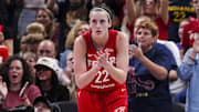 Sep 13, 2024; Indianapolis, Indiana, USA; Indiana Fever guard Caitlin Clark (22) celebrates while on defense Friday, Sept. 13, 2024, during a game between the Indiana Fever and the Las Vegas Aces on Friday, Sept. 13, 2024, at Gainbridge Fieldhouse in Indianapolis. The Aces defeated the Fever, 78-74.  Mandatory Credit:  Grace Smith/USA TODAY Network via Imagn Images
