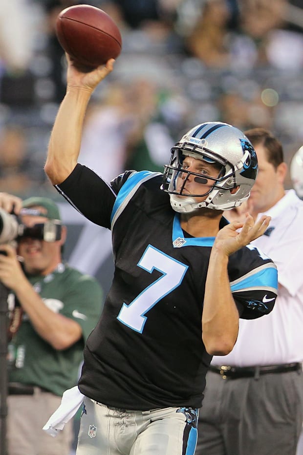 Carolina Panthers quarterback Jimmy Clausen throws a pass during warmups for their game against the New York Jets Carolina Panthers quarterback Jimmy Clausen throws a pass during warmups for their game against the New York Jets