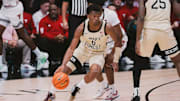 Wake Forest guard Myles Colvin dribbles the ball against Texas Tech