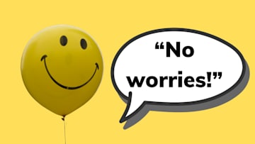 A smiley face balloon next to a speech bubble of the phrase “No worries!”