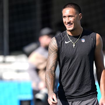 Oct 26, 2025; Charlotte, North Carolina, USA; Carolina Panthers wide receiver Tetairoa McMillan (4) warms up before a game against the Buffalo Bills at Bank of America Stadium. 