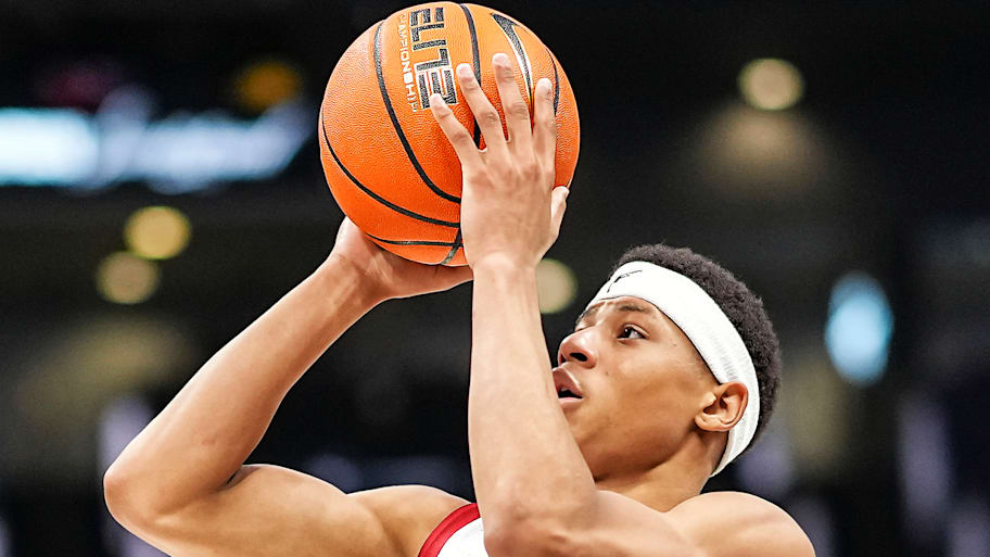Jeremiah Fears shoots a jump shot against Michigan in a December game. | Matt Kelley/Getty Images