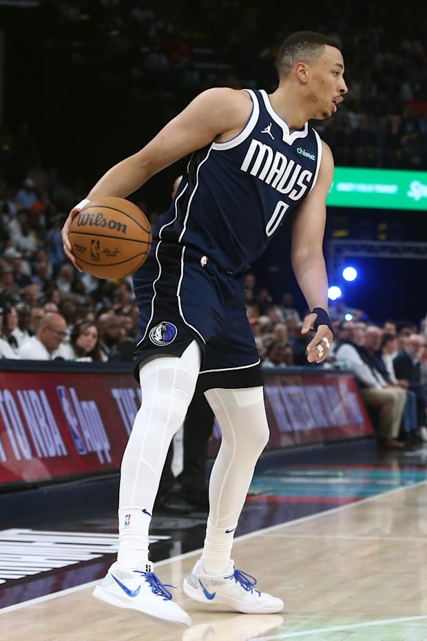 Dallas Mavericks guard Dante Exum dribbles during the first quarter against the Memphis Grizzlies