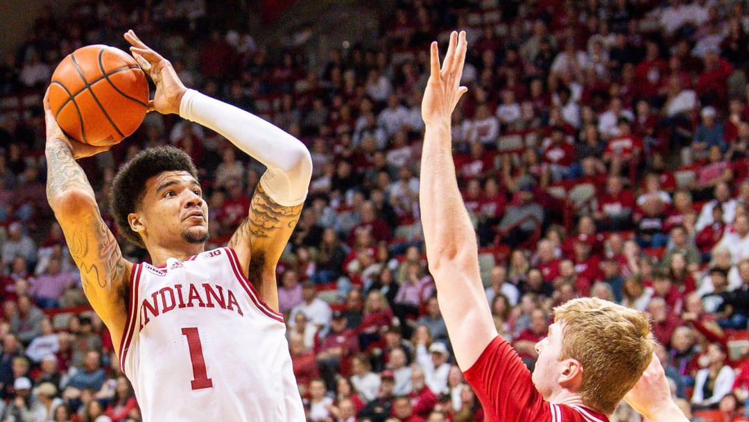 Indiana's Kel'el Ware (1) scores past Wisconsin's Steven Crowl (22) during the first half of the