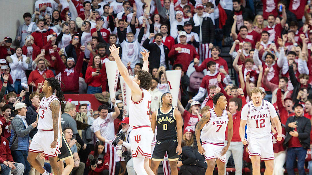 Indiana's Lamar Wilkerson (3), Conor Enright (5), Nick Dorn (7) and Tucker DeVries 