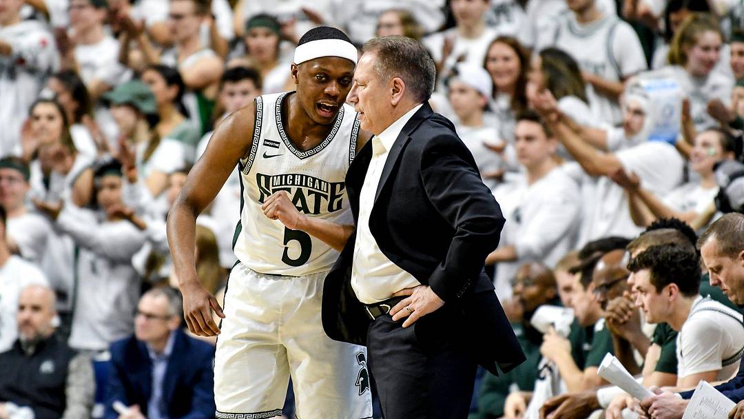 Michigan State's Cassius Winston, left, talks with head coach Tom Izzo during the first half on Sunday, March 8, 2020, at the Breslin Center in East Lansing.

200308 Msu Osu 044a
