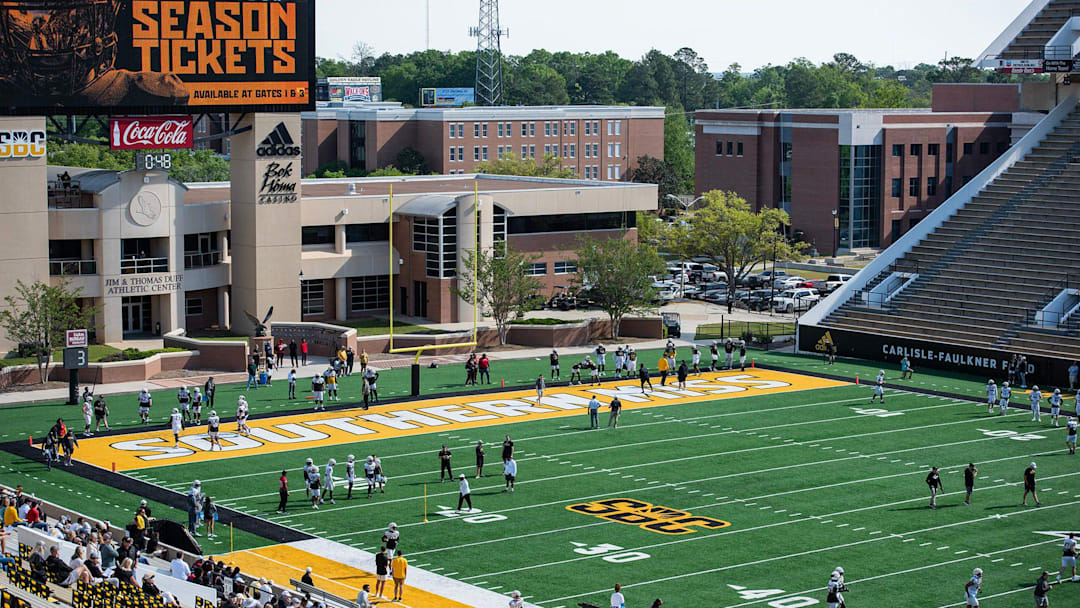 The Southern Miss Golden Eagles' warm up on the field for the spring game at the M.M. Roberts Stadium in Hattiesburg, Miss., on Saturday, Apr. 6, 2024.